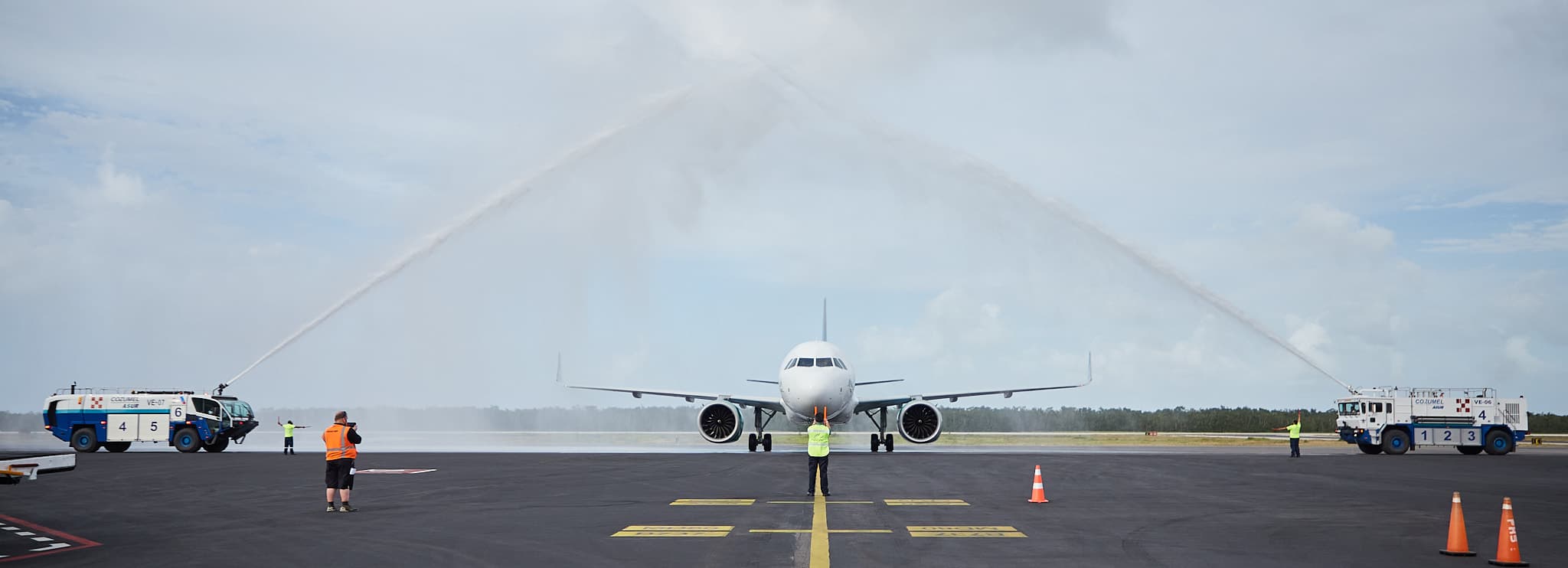 Plane on the runway at a Mexican Caribbean airport