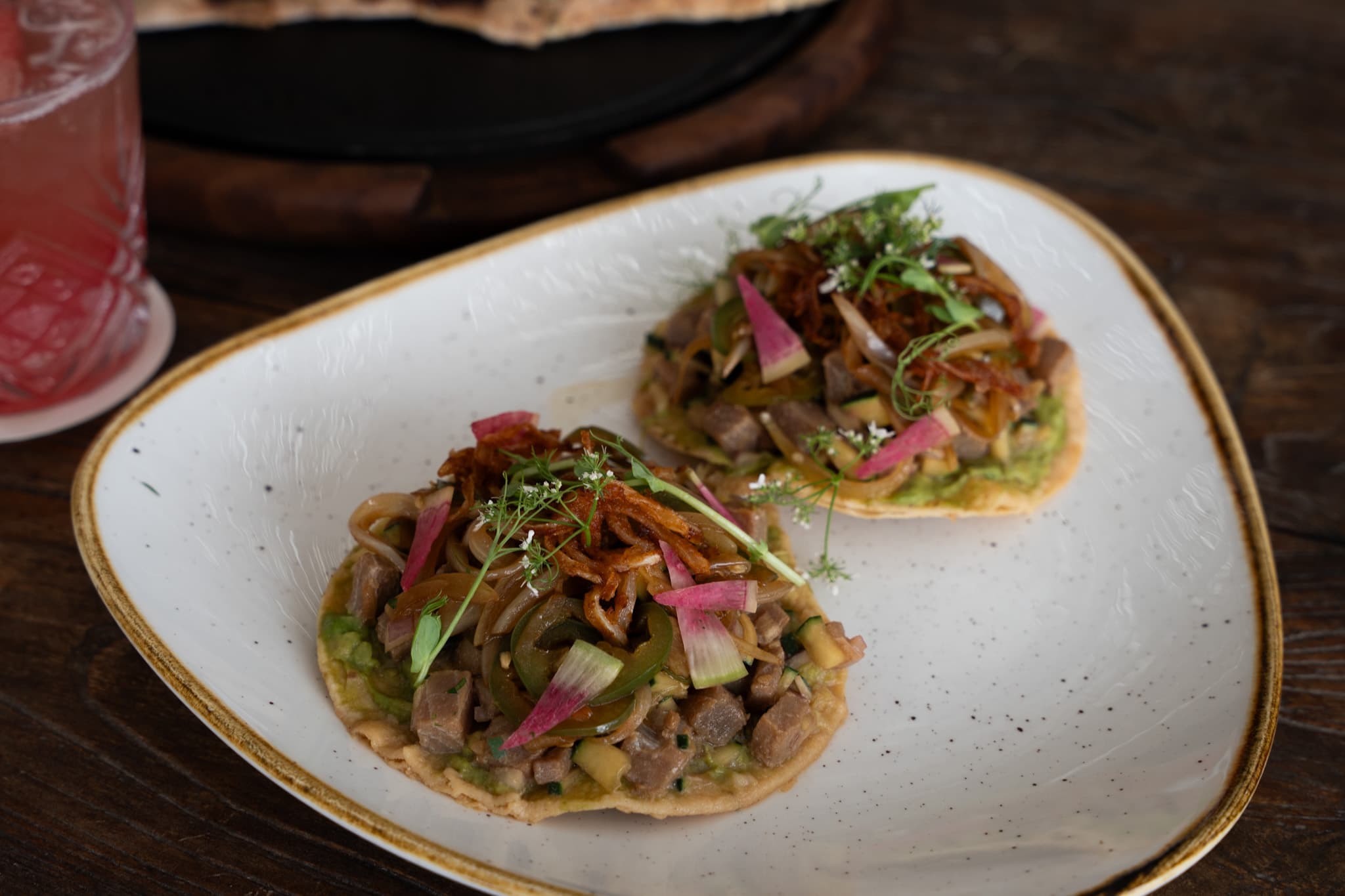 Tostadas served on a ceramic plate