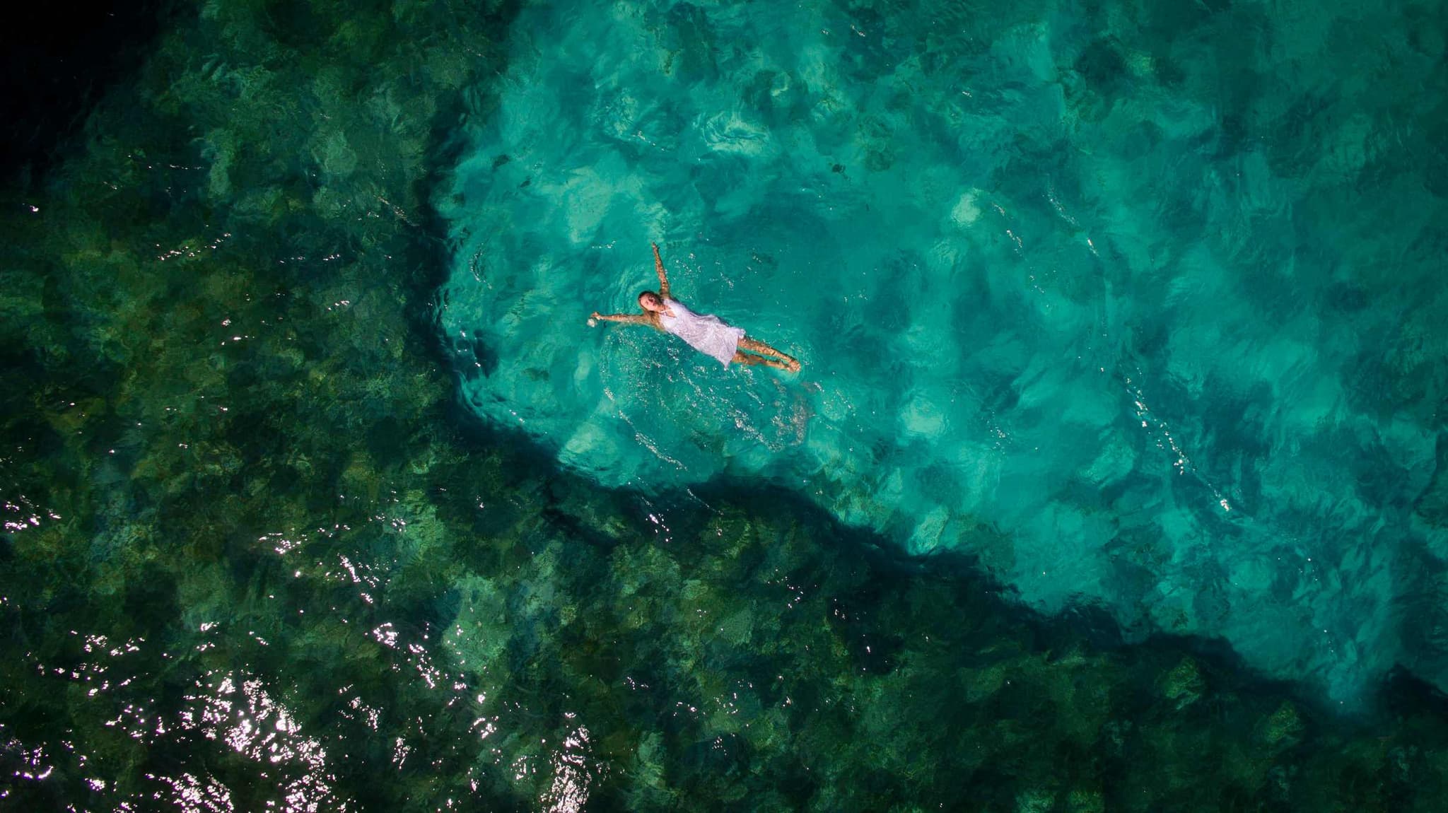 Person swimming over the Puerto Morelos reef