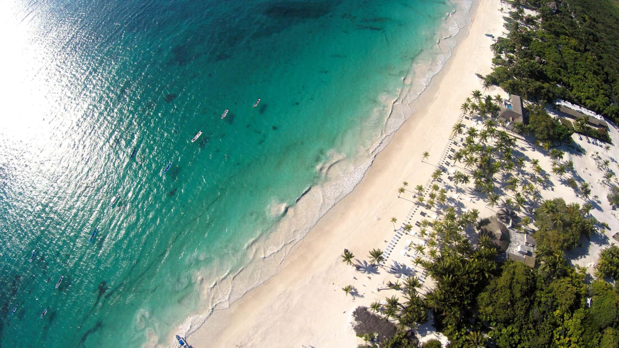 Aerial view of a white sand beach in the Riviera Maya