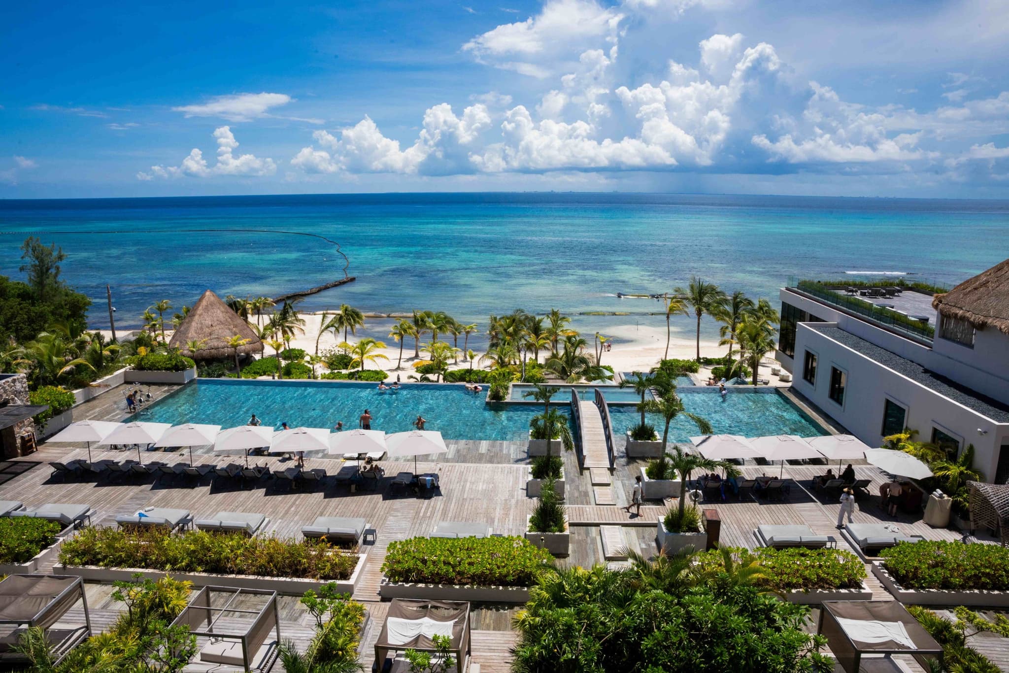 Pool at a beachfront hotel in the Riviera Maya
