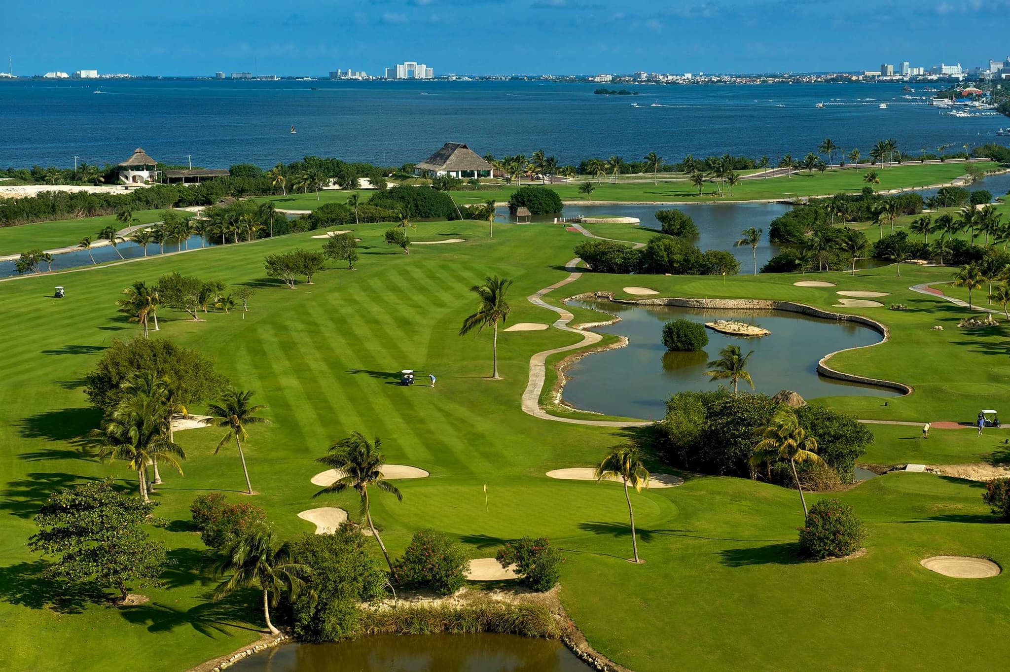 Aerial view of a golf course facing the lagoon