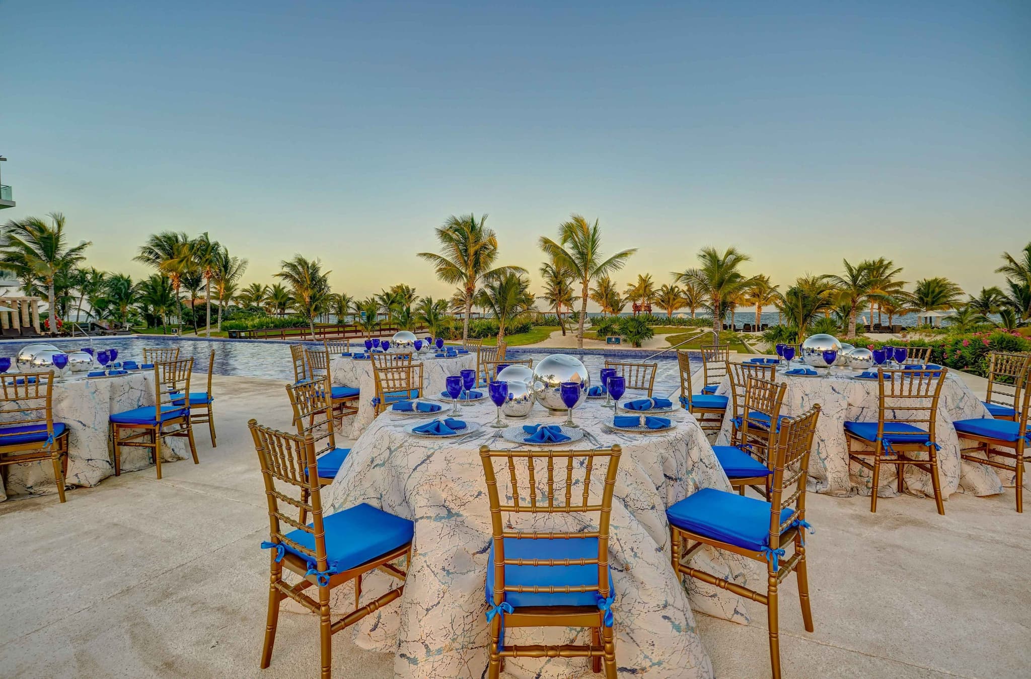 Banquet tables beside the pool