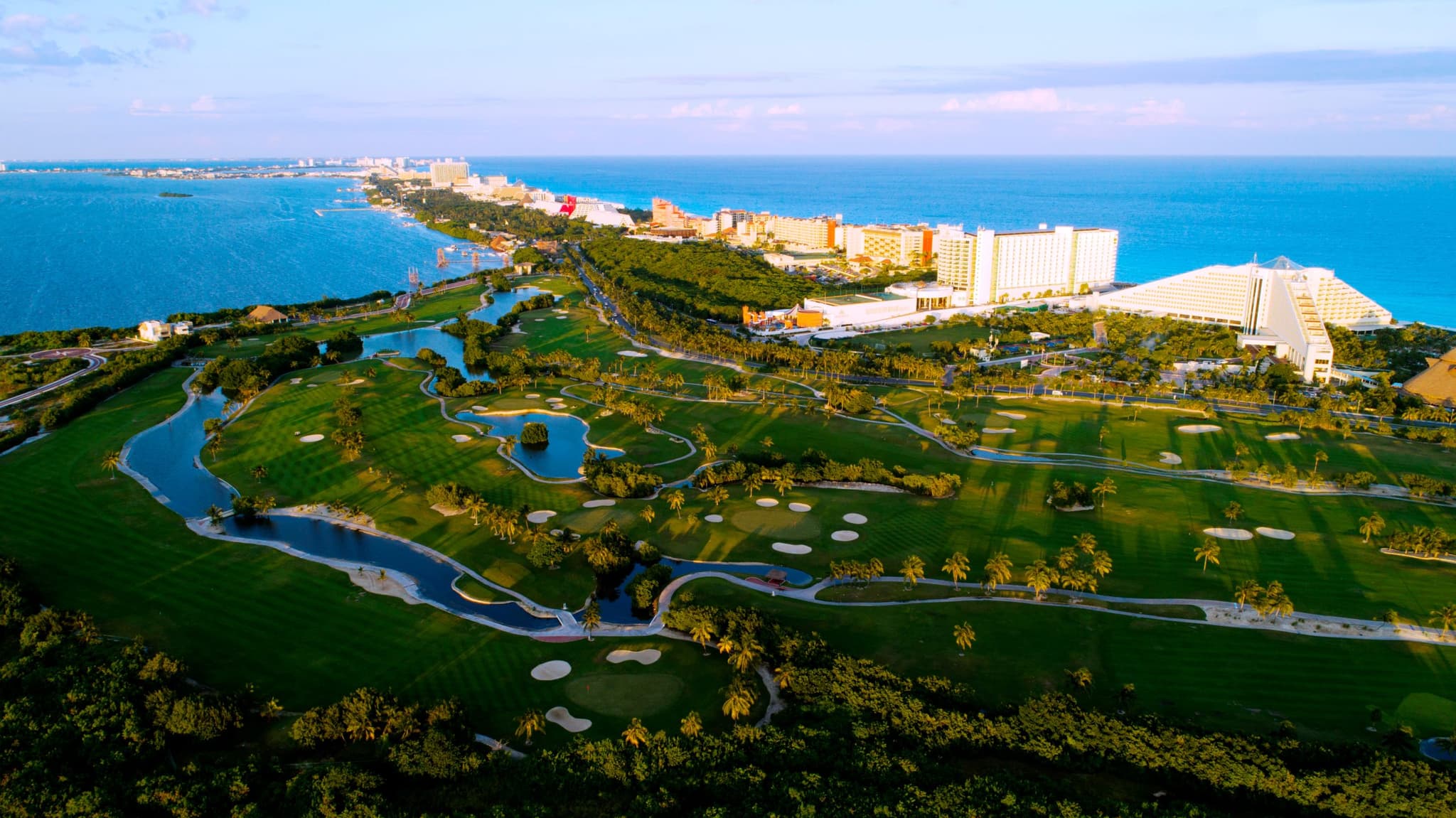Aerial view of a golf course facing the sea