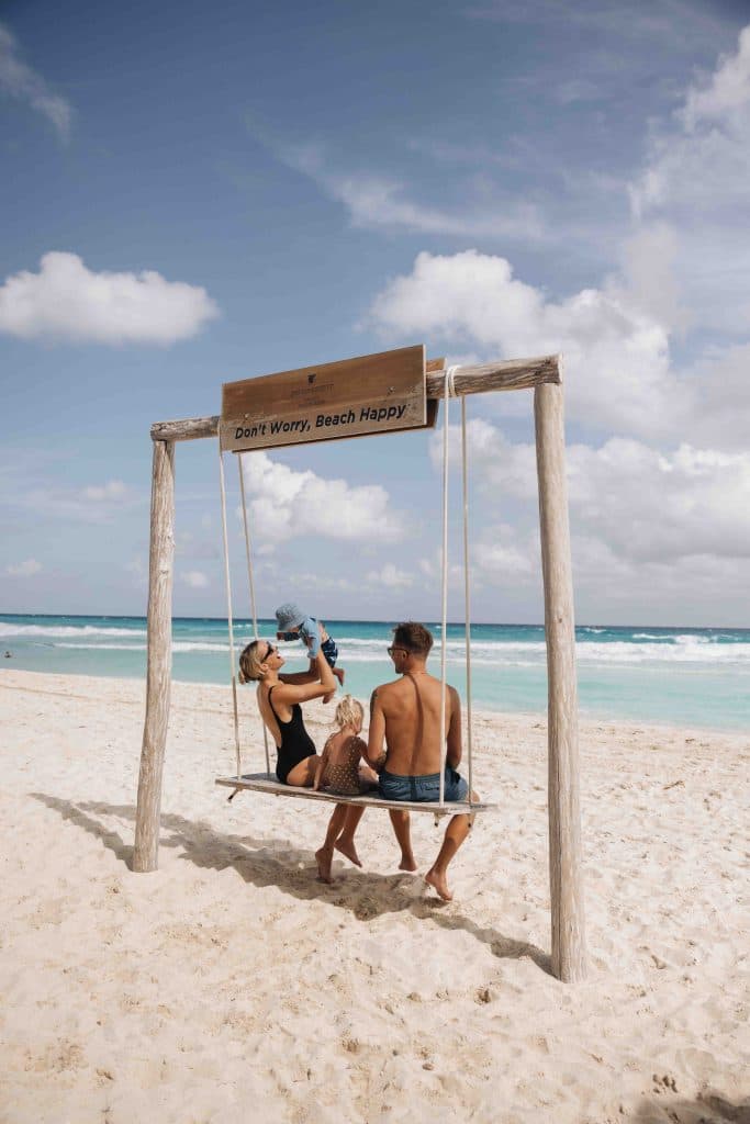 Family enjoying a day by the sea in the Mexican Caribbean