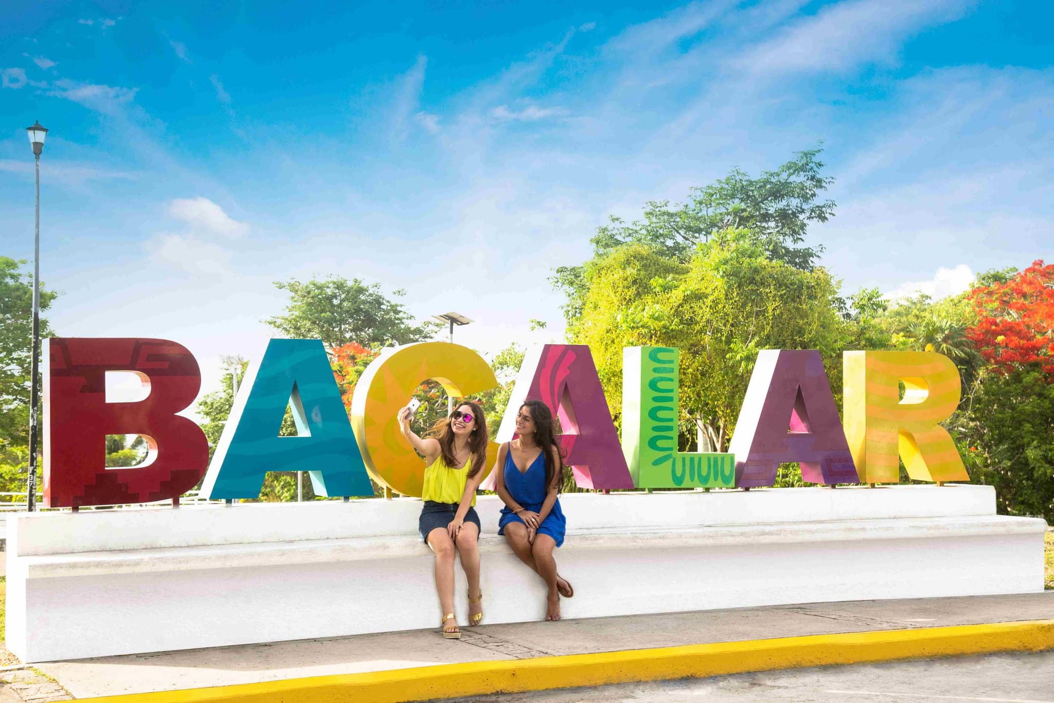 Bacalar's monumental letters facing the lagoon