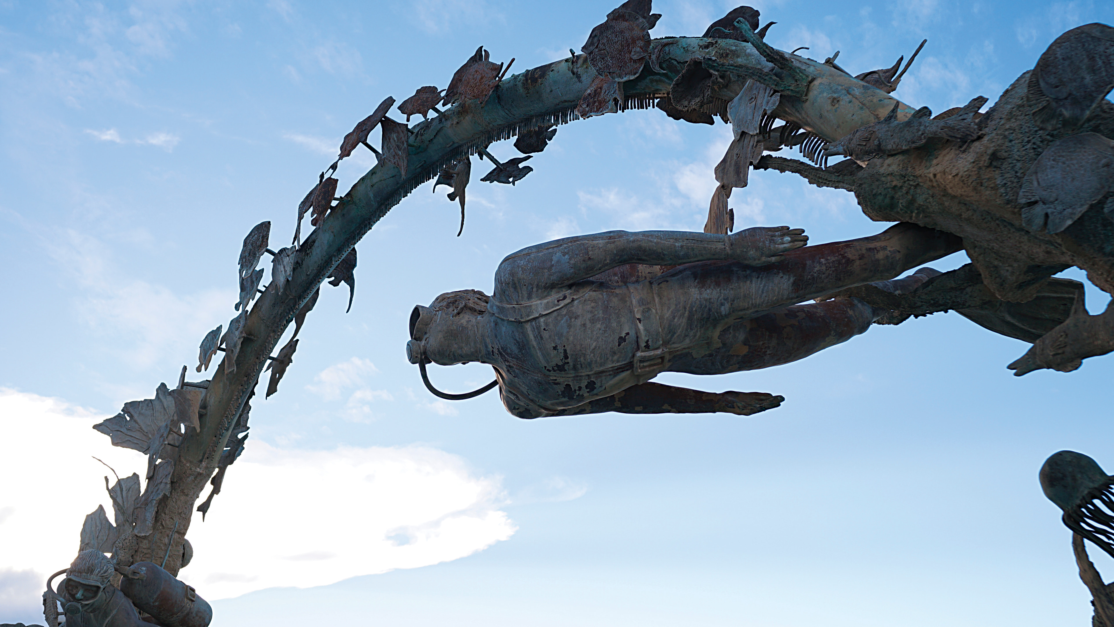 Monument to the Diver on the San Miguel seafront in Cozumel, against the sky